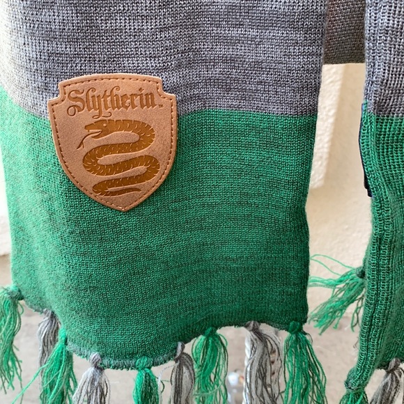 Warner Bros. Other - Slytherin Harry Potter scarf. So cute and fab with fringes at the bottom.